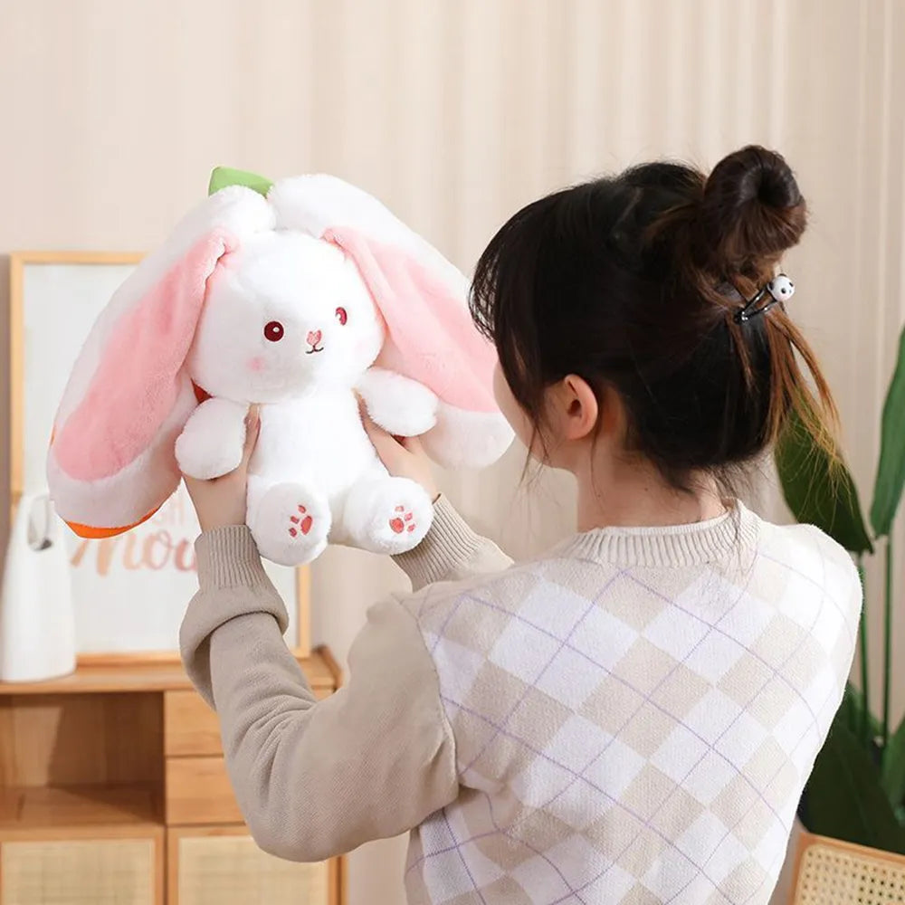 Close-up of a girl holding a white Reversible Bunny Plush with long pink ears - Cute Soft Toy - Octoplush Kawaii Aesthetic