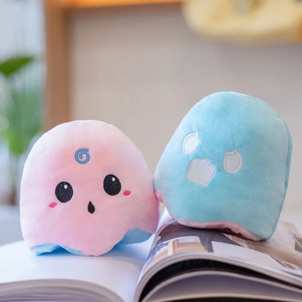 Reversible Ghost Plush - Moody Ghost Plush - Glow in the dark Ghost plush - Flip Ghost - Octoplush - Light Blue & Pink on Book