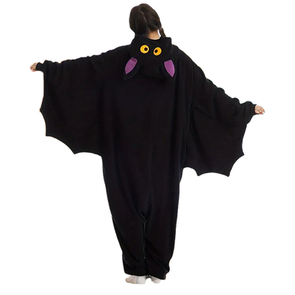 Back view of adult bat onesie Halloween costume with wide black wings and hood featuring yellow eyes and purple bat ears