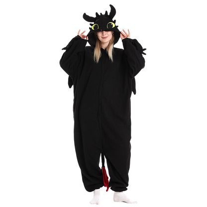 Black dragon onesie kigurumi with detailed hood, wings, and tail, modeled on a transparent background. Ideal for dragon onesie and kigurumi fans